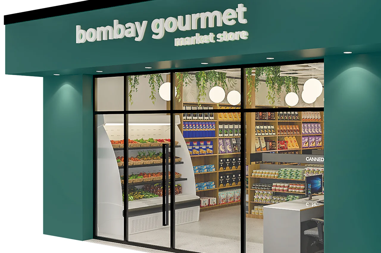 Contemporary retail design at Bombay Gourmet, highlighting bespoke shelving for a premium selection of wines and chocolates.